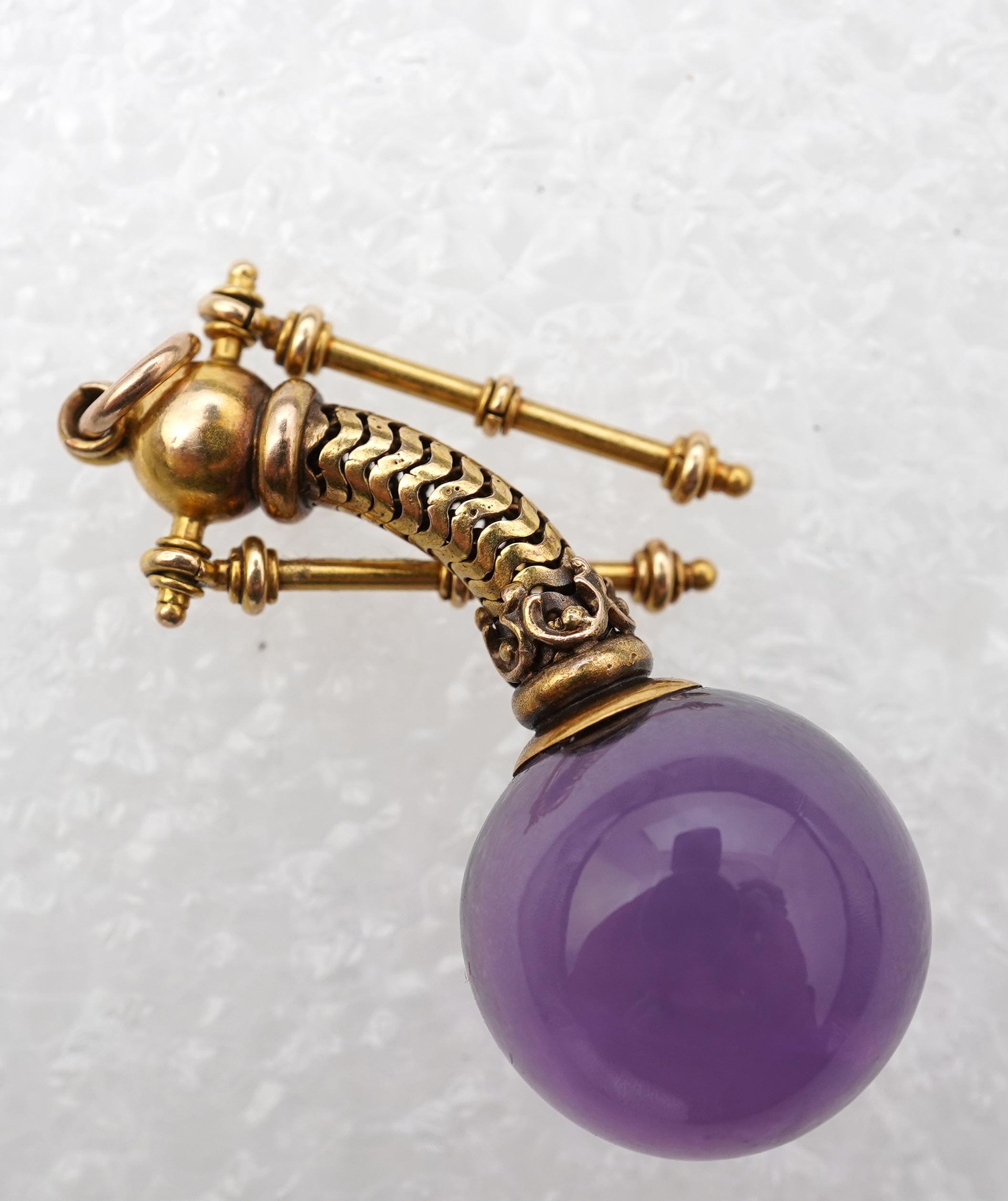 An unusual Victorian gold and amethyst pendant, mid 19th century